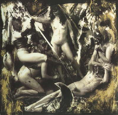 1988-Apollonia_and_dominatrix_creating_pain_in_the_heart_of_the_west.jpg
